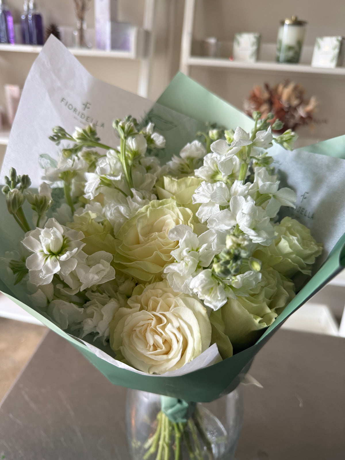 Bouquet of all white blooms, hand-wrapped