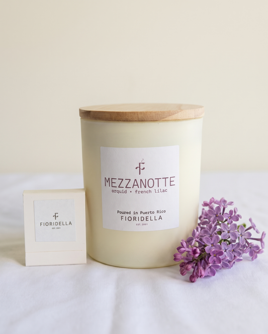 Mezzanotte soy candle in a frosted glass jar, orchid, French lilac and rose
