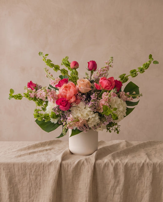 Blushing Beauty bouquet in shades of pink, from soft blush to hot pink